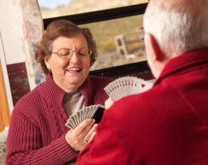 patients enjoying playing cards