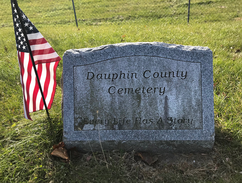 grave reading 'every life has a story'
